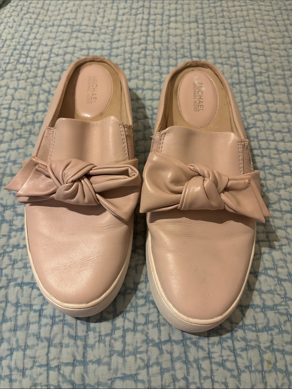 Michael Kors slip on leather shoes.